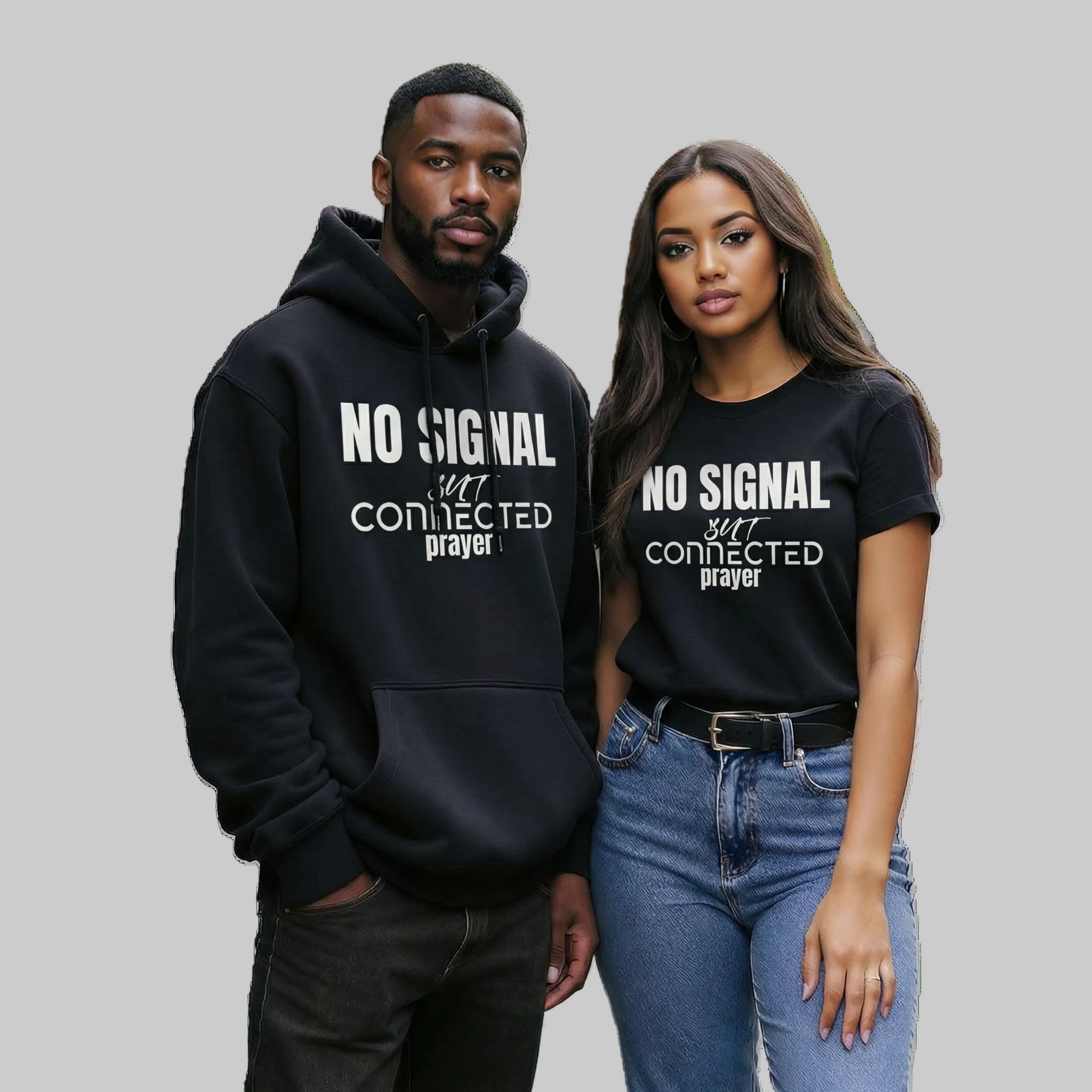 Man and woman wearing black hoodies and t-shirts with 'No Signal But Connected by Prayer'. No signal in the streets.
Still connected upstairs.
