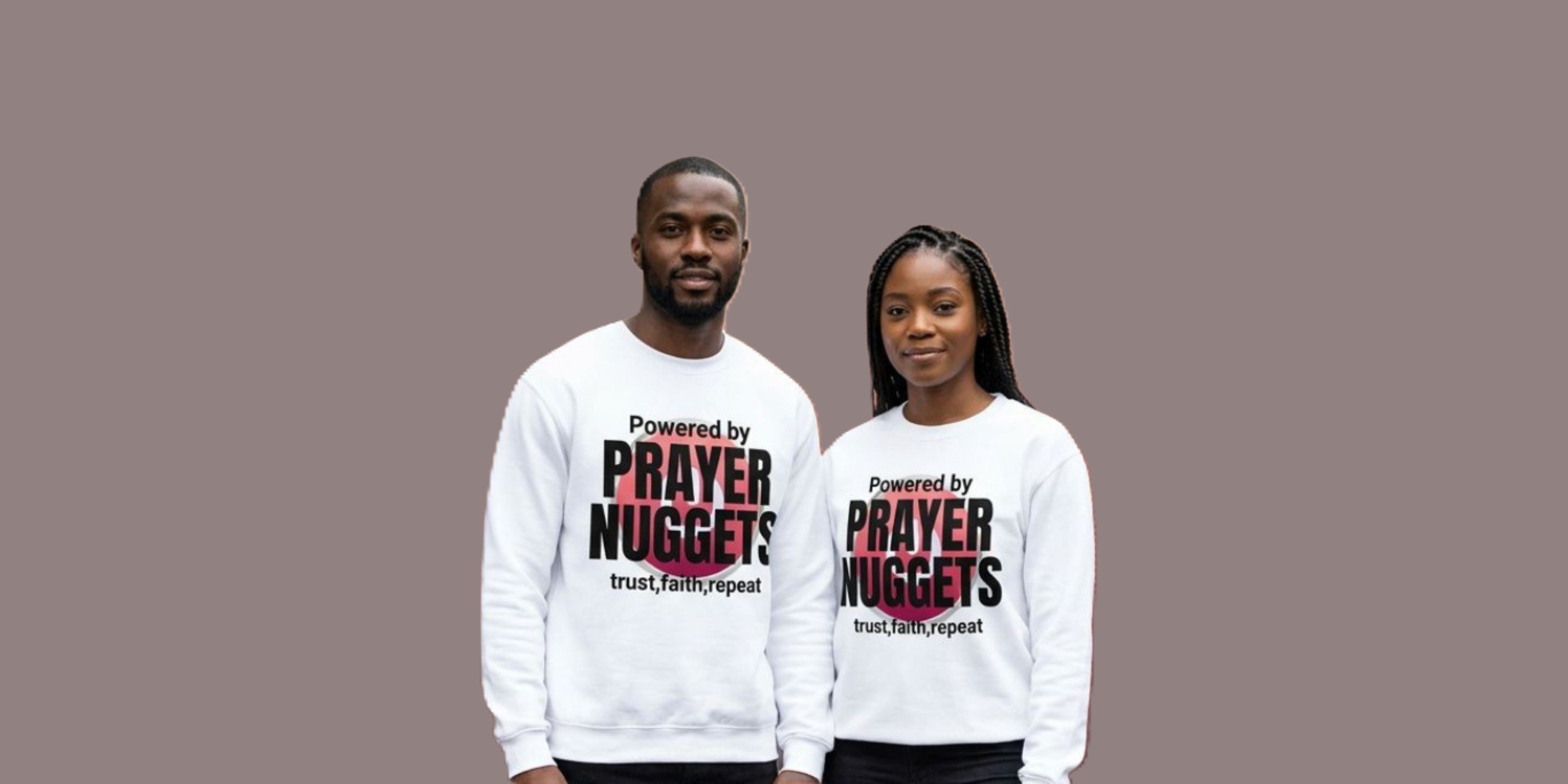 Two people wearing white sweatshirts with 'Powered by Prayer Nuggets' text on a brown background